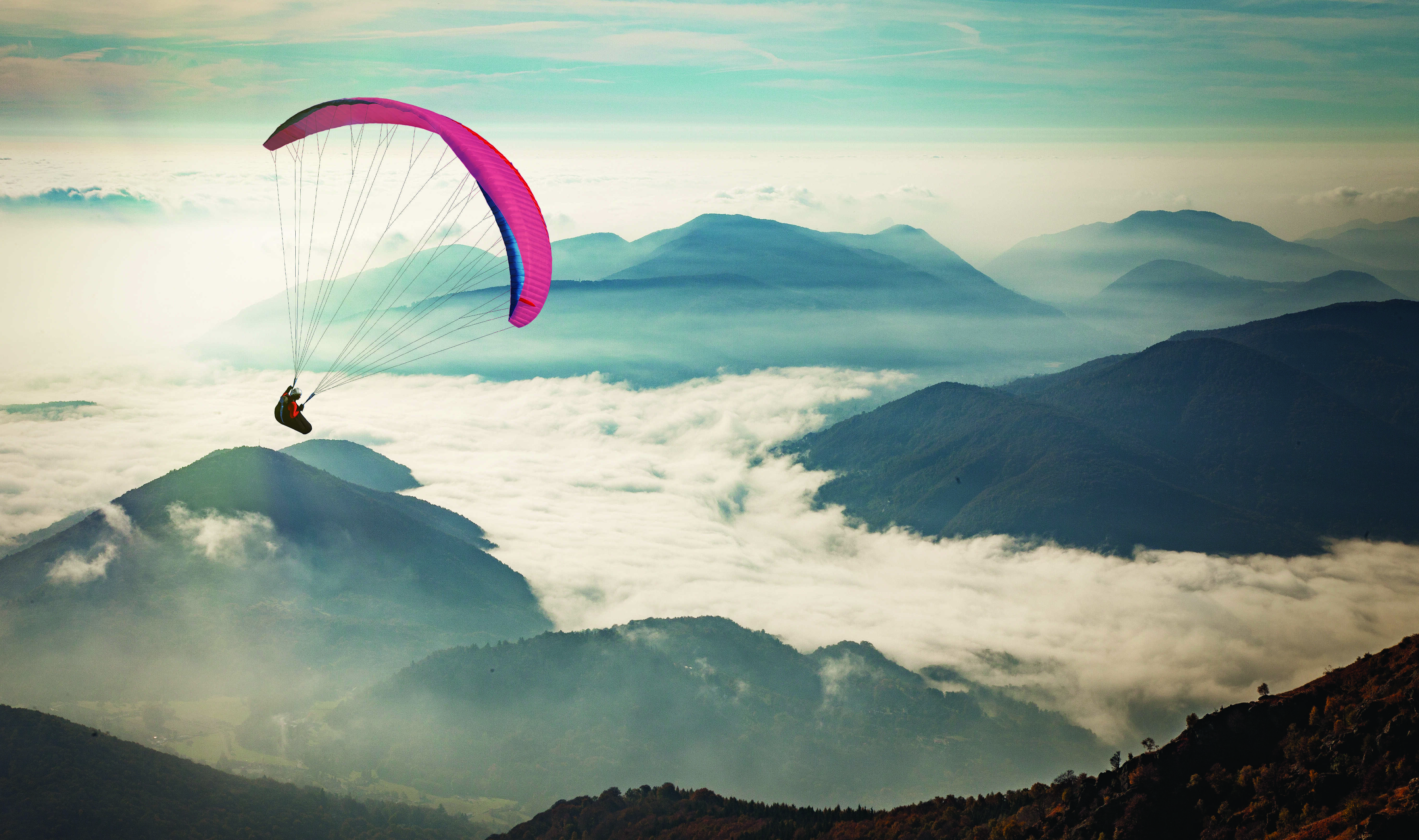 Parachute above the clouds