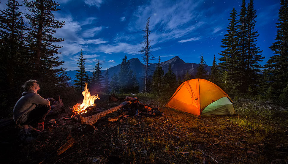 Man camping on mountain